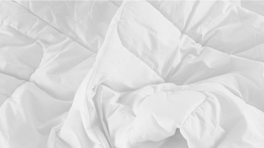 garnissage couette naturelle blanche gonflante qualite