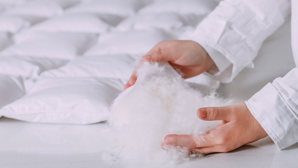 garnissage couette duvet canard densite
