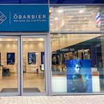 devanture de la maison de coiffure obarbier vaulx en velin a lyon
